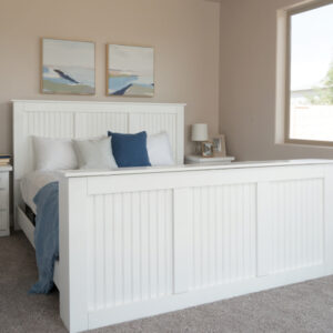 decorated white tv lift bed