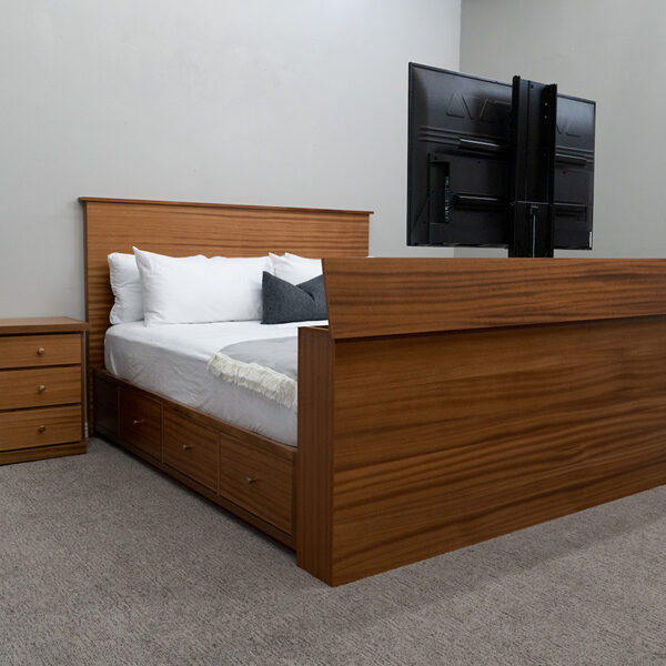 wood tv lift bed with tv and wood dresser