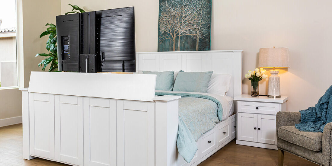 decorated white tv lift bed with tv