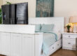 decorated white tv lift bed with tv