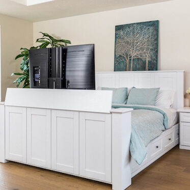 decorated white tv lift bed with tv