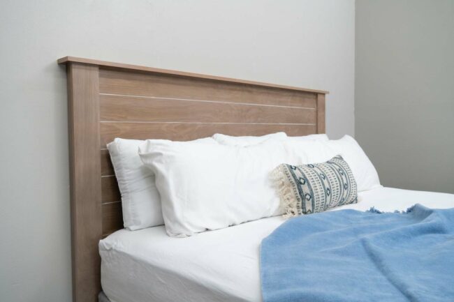 headboard of decorated wooden bed