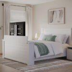 white bed with tv lifting out of footbed