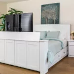 tv coming out of a white footbed
