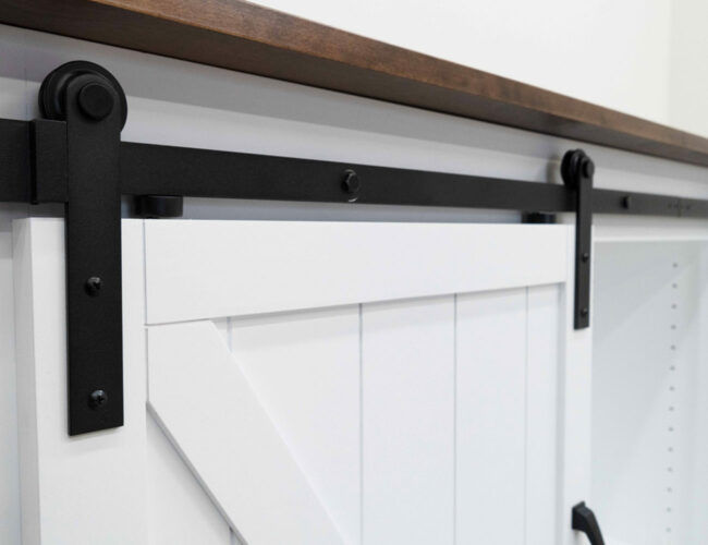 closeup view of fancy white tv lift media console