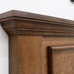 corner of wooden bed