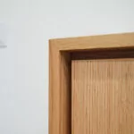 corner of wood tv lift cabinet