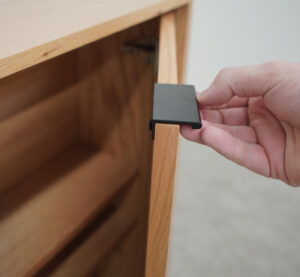 opening a wood tv lift cabinet